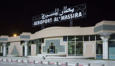 Private driver at Agadir Al Massira Airport (AGA) providing reliable and comfortable Agadir airport transfers with modern vehicles.