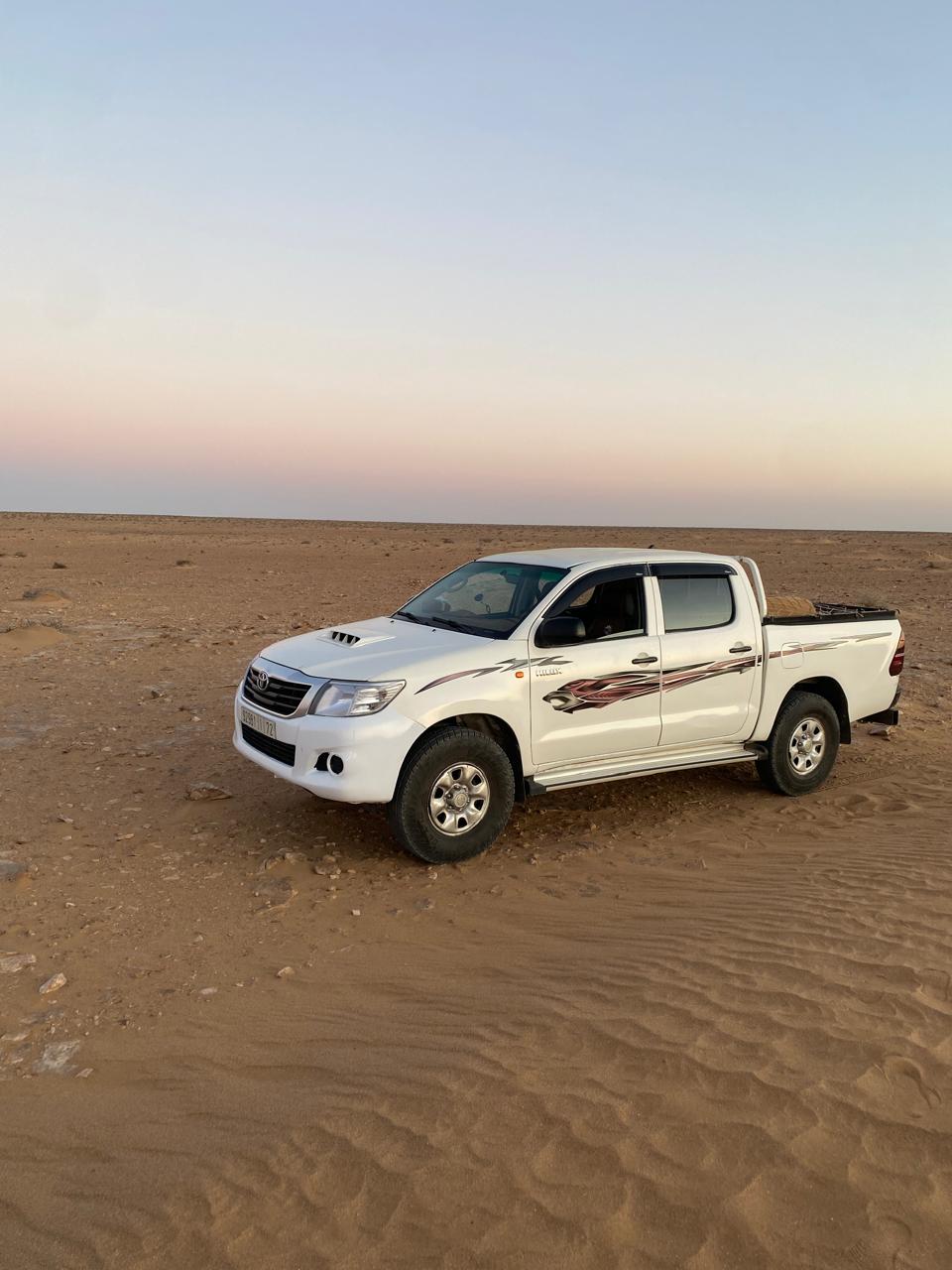 Toyota Hilux 4x4 on a desert track in the Moroccan Sahara